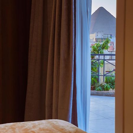 King Khufu Pyramids View Hotel Kafret el-Gabal Quarto foto