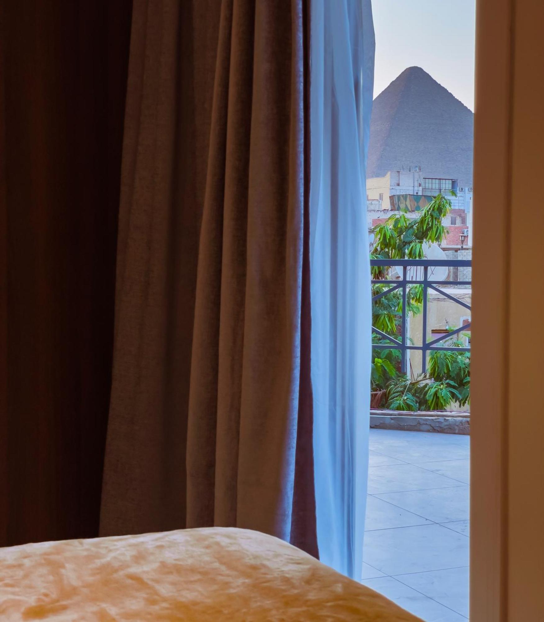 King Khufu Pyramids View Hotel Kafret el-Gabal Quarto foto