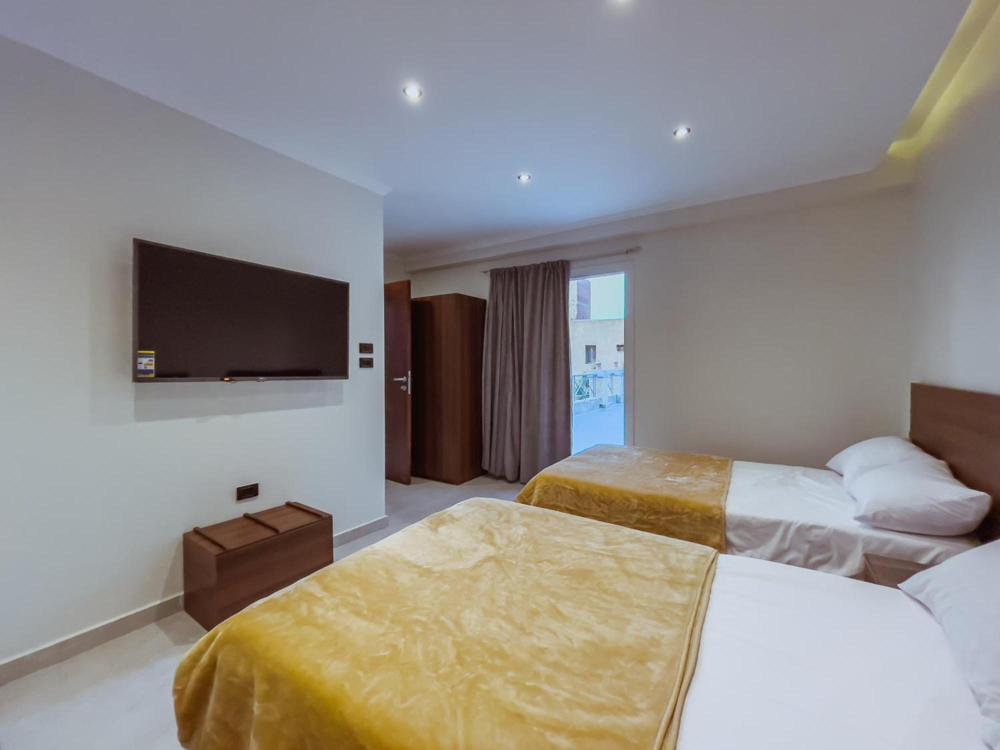 King Khufu Pyramids View Hotel Kafret el-Gabal Quarto foto