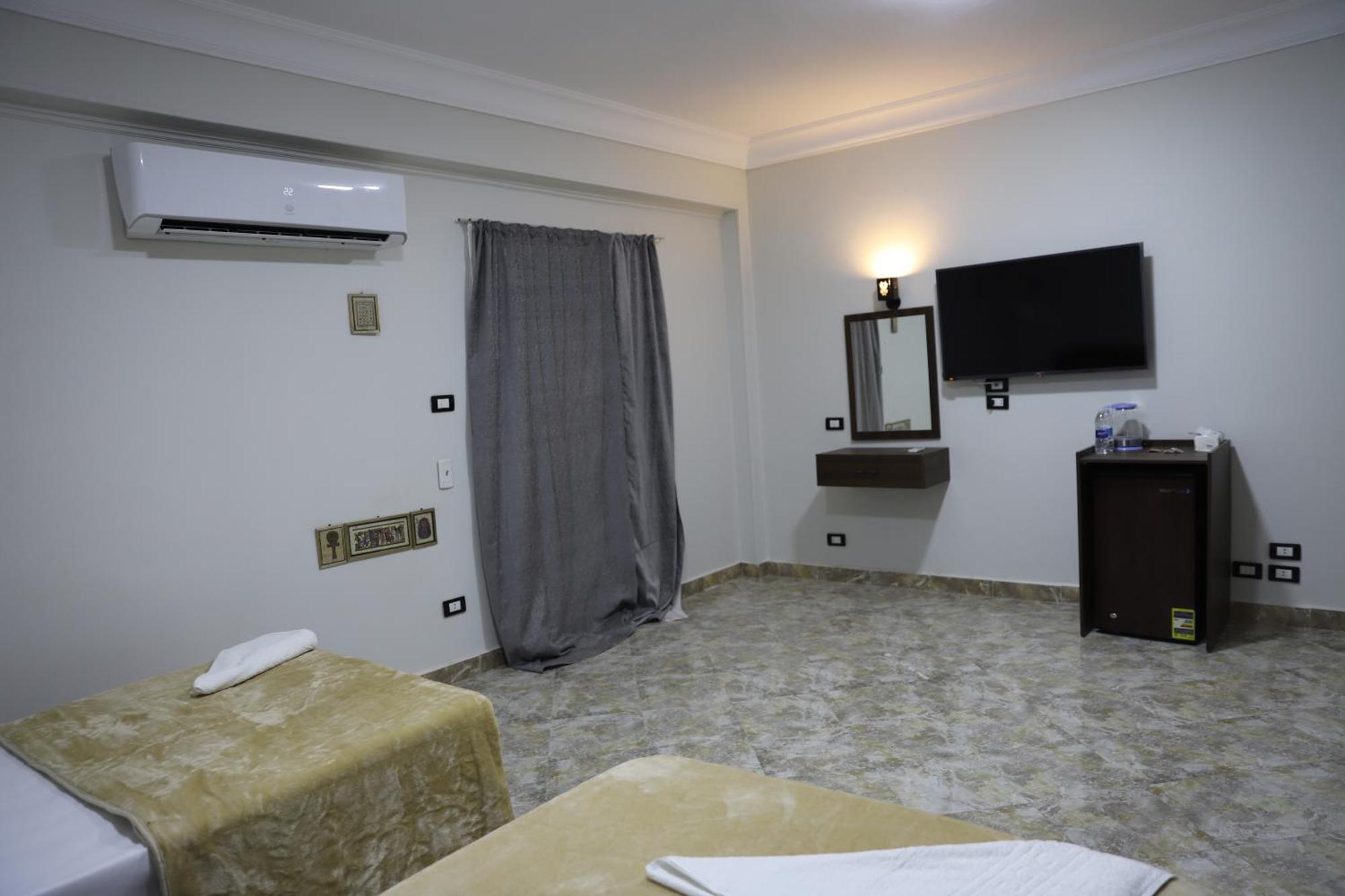 King Khufu Pyramids View Hotel Kafret el-Gabal Quarto foto