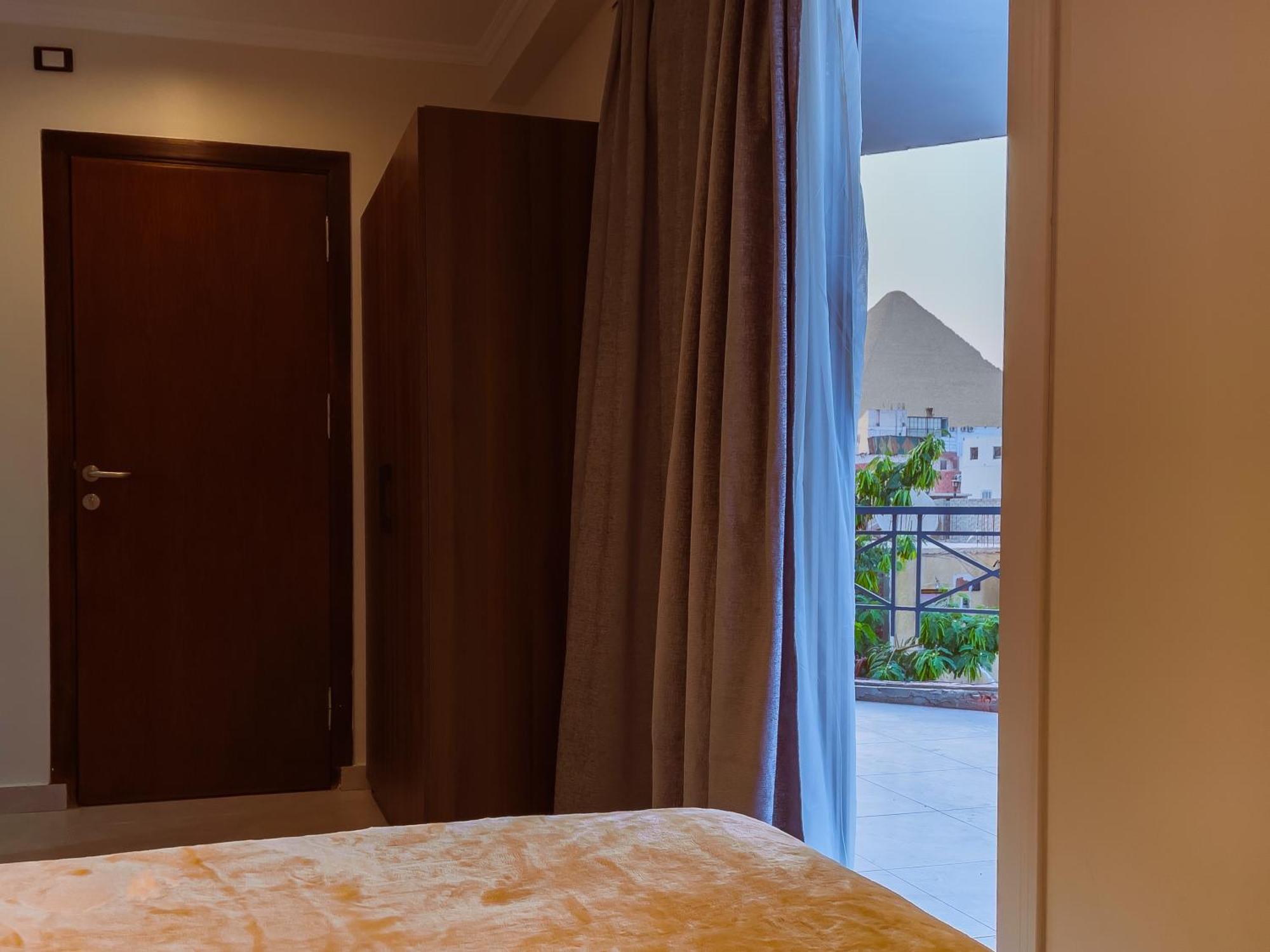 King Khufu Pyramids View Hotel Kafret el-Gabal Quarto foto