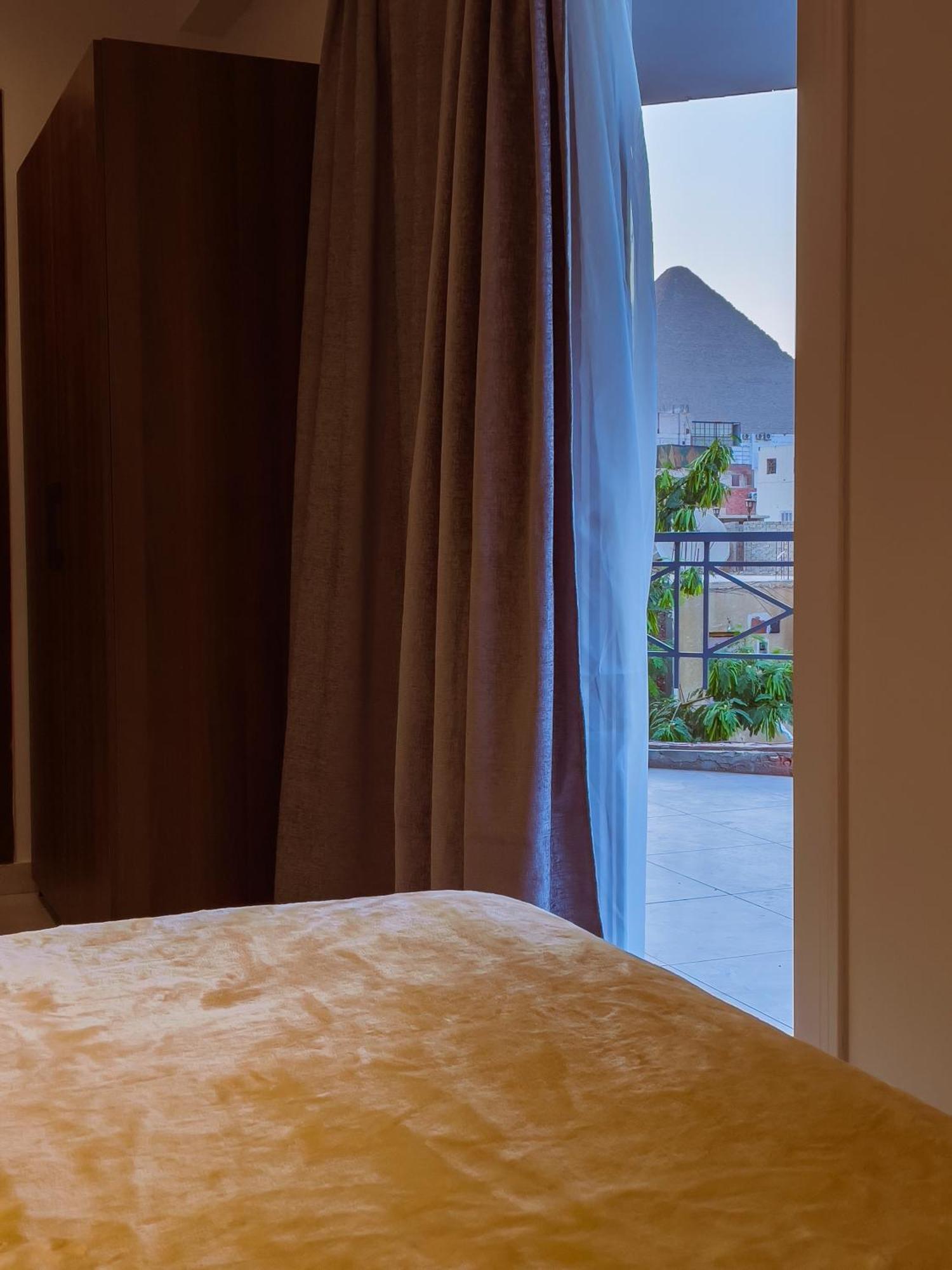 King Khufu Pyramids View Hotel Kafret el-Gabal Quarto foto